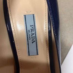 Prada navy heels worn 2 times Beautiful comes with 2 extra heel tips